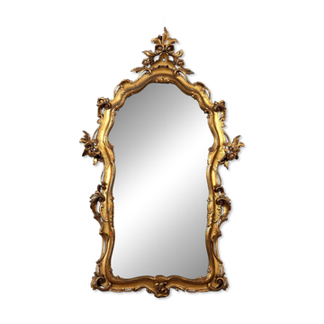Antique baroque-style mirror in gilded wood, 20th century.