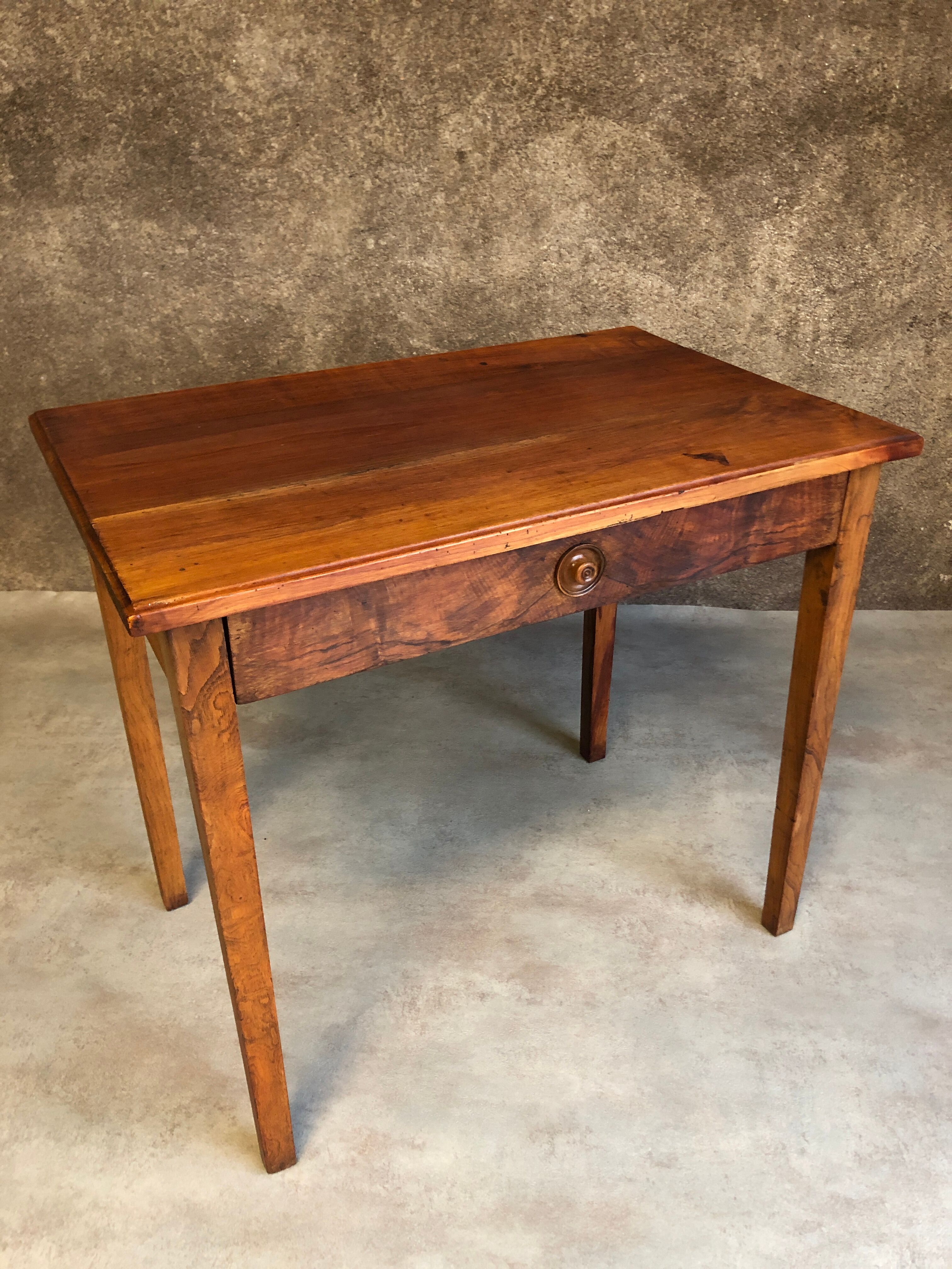Walnut wood desk with a drawer