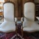 Pair of antique Voltaire armchairs, carved back