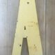 Vintage yellow sign letter A