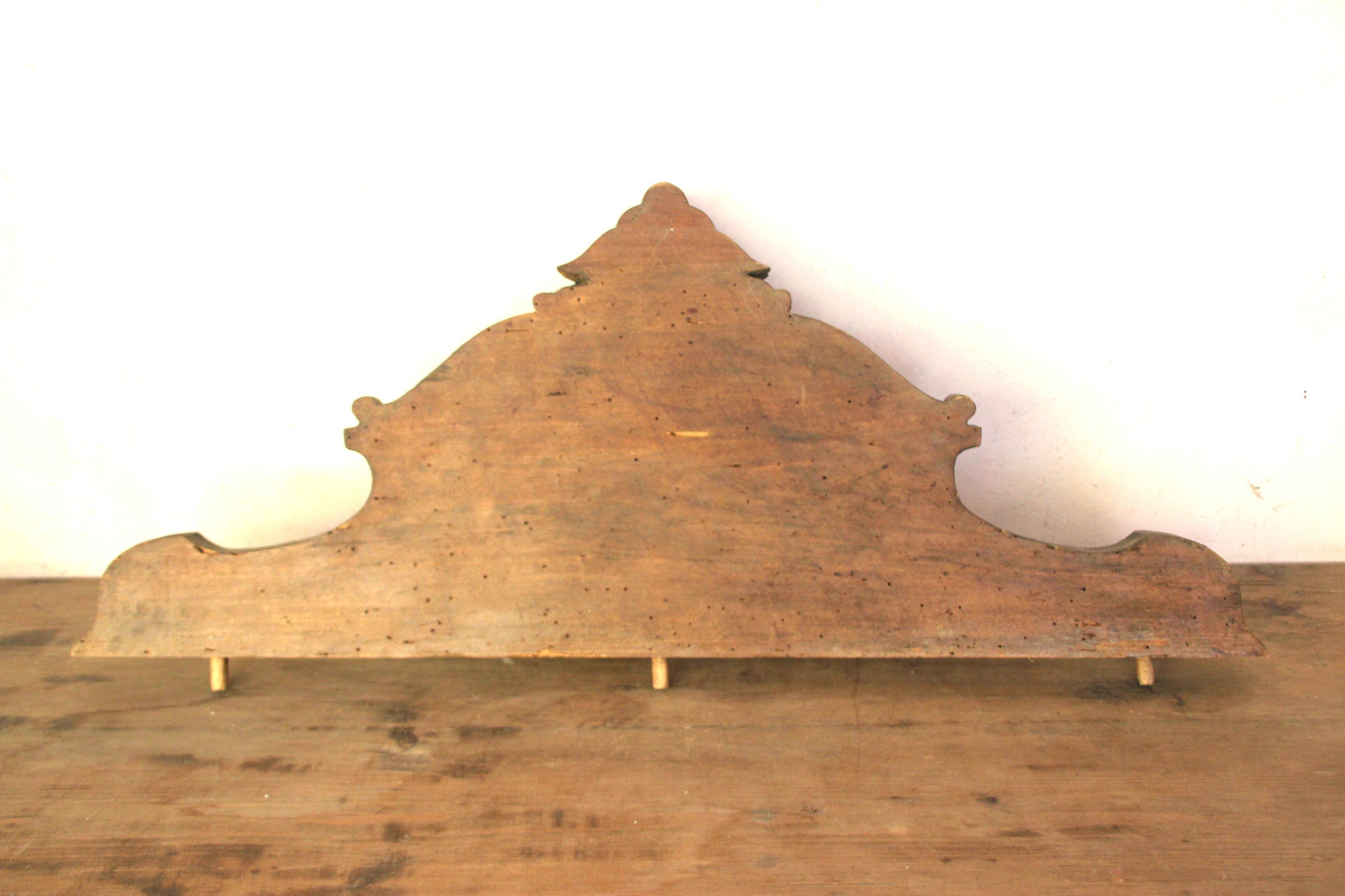 Old pediment in solid and marquetry wood