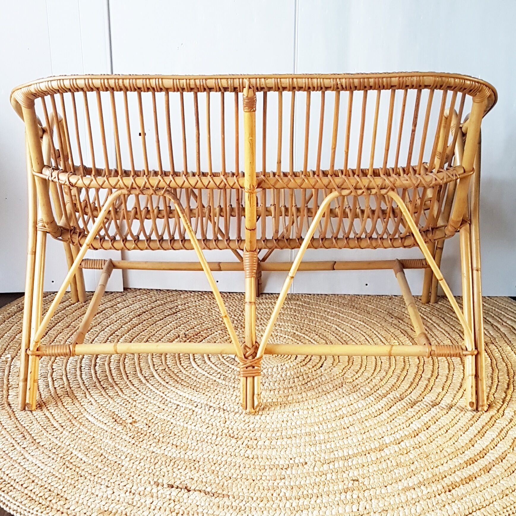 Bench into rattan 2 seater of the sixties