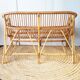 Bench into rattan 2 seater of the sixties