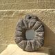 Brutalist mirror in hand-carved natural stone