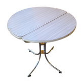 Table ronde en formica pliante