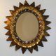 Oval sun mirror, 61x52cm.