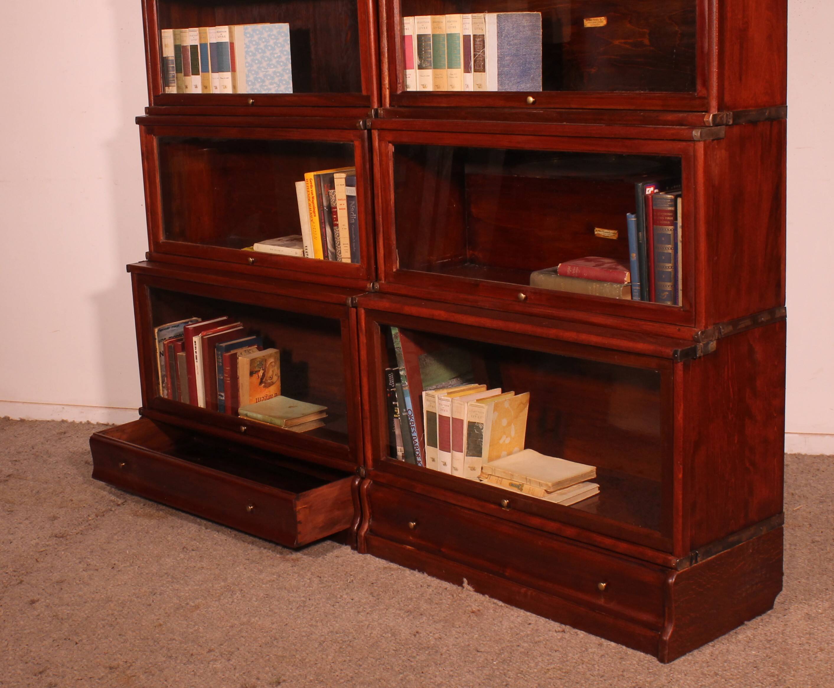 pair of Globe Wernicke London bookcases known as waterfall in mahogany circa