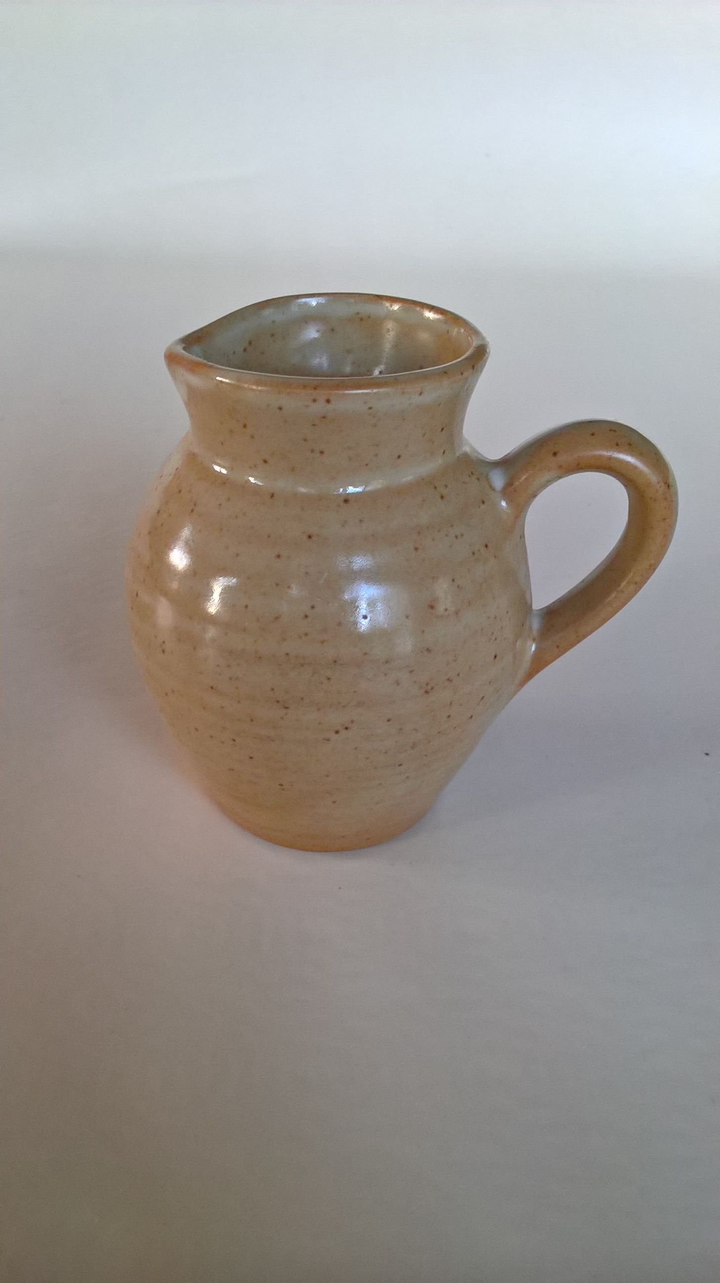 Creamy milk pot in sandstone Village CNP France