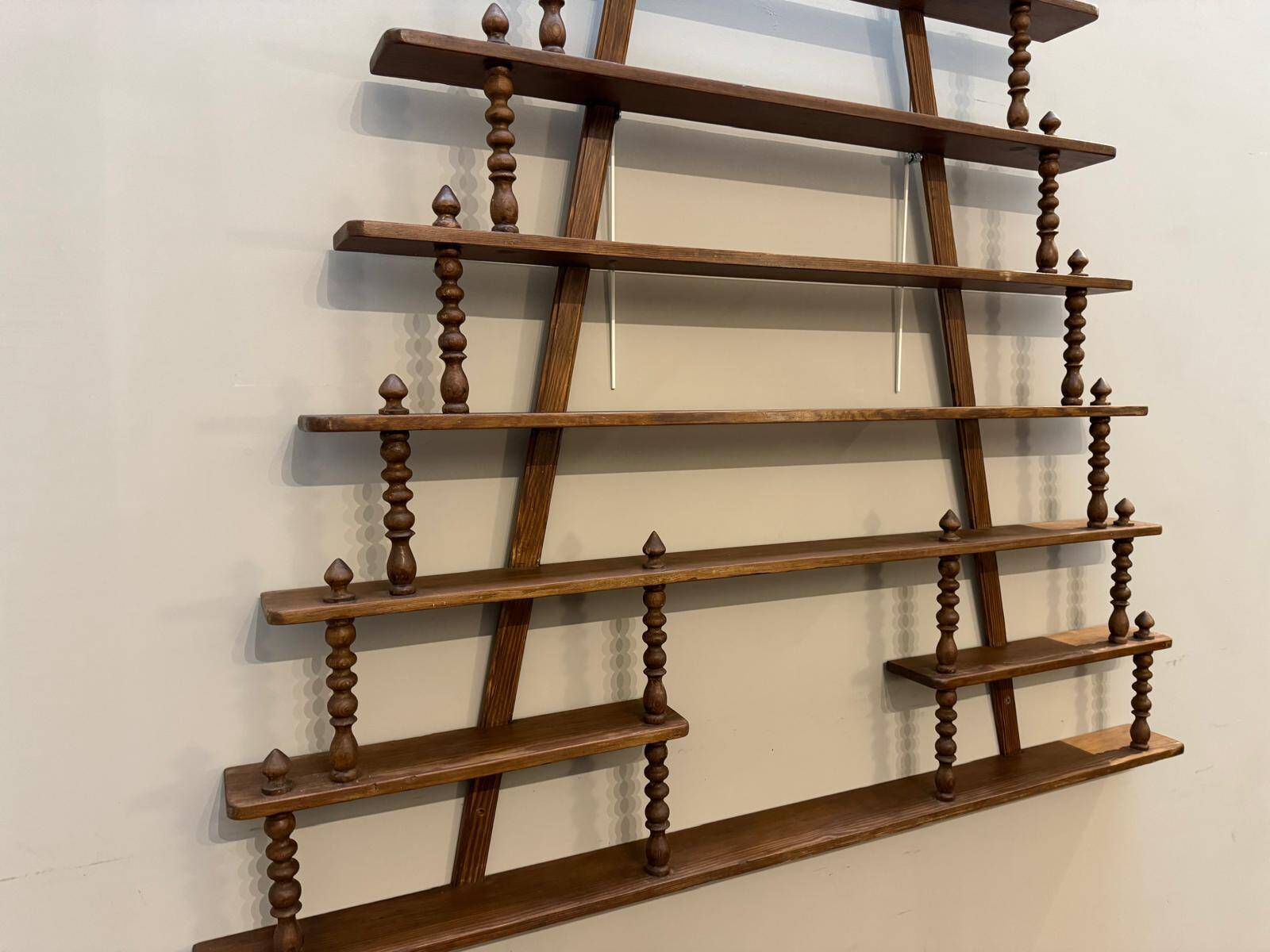 Turned wood bar wall shelf