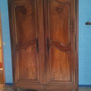 Large Louis XV style gendarme's hat-shaped wardrobe
