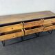 Antique wooden console with black metal base and 6 drawers