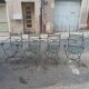 Deux fauteuils et deux chaises de jardin en fer forgé 20 eme