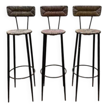 Suite de 3 tabourets de bar en acier et paillés