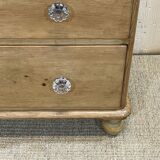 English chest of drawers in nineteenth century fir with its glass buttons