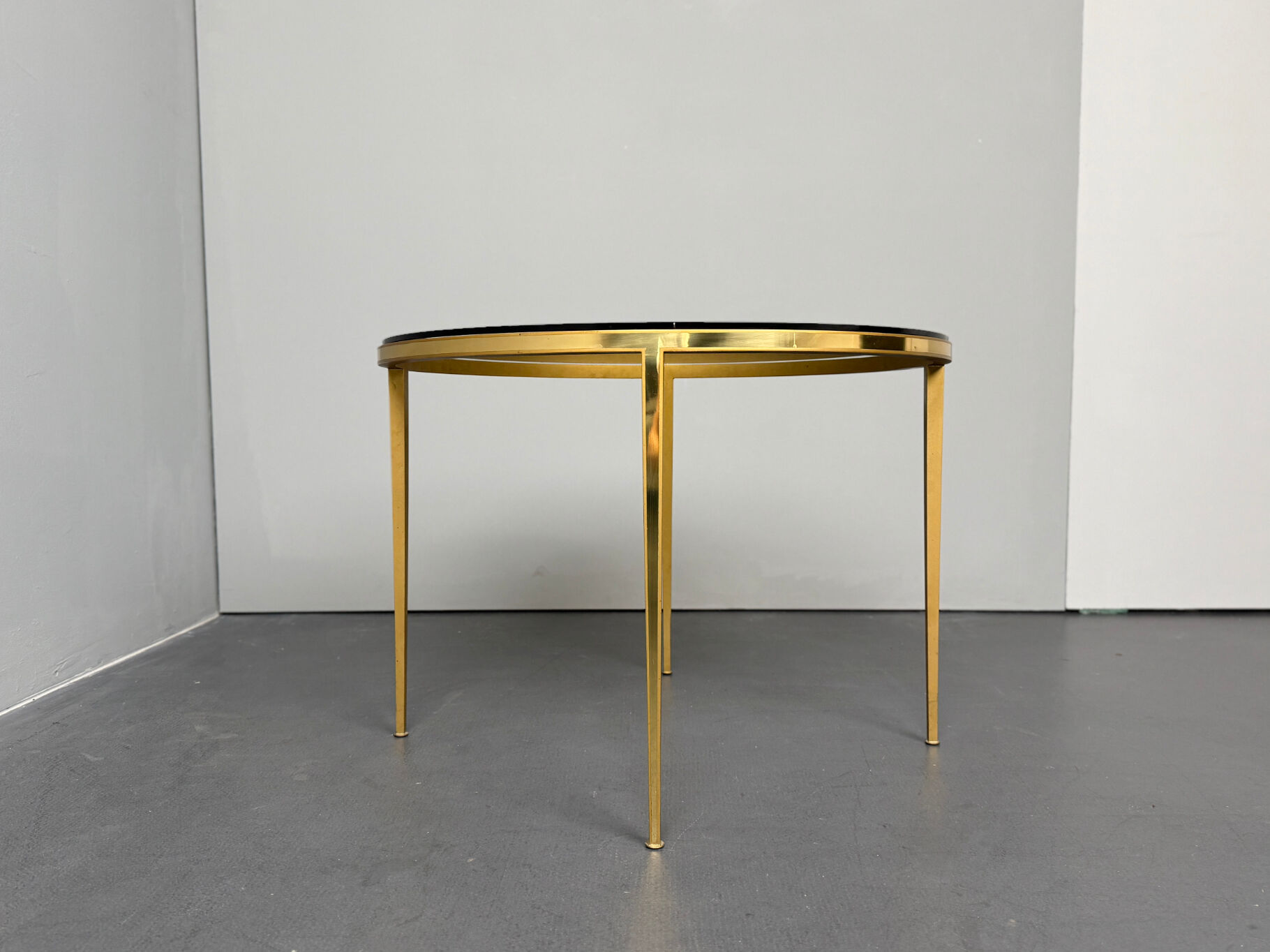 Hollywood Regency coffee table in brass and glass by Vereinigte Werkstätten, Germany, 1960s