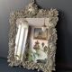 Antique Italian mirror in repoussé silver metal