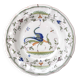 Assiette creuse en faïence de Moustiers décorée d'un oiseau, XIXe