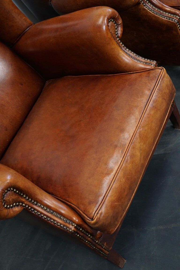 Set of 2 vintage club armchairs in cognac leather, Netherlands