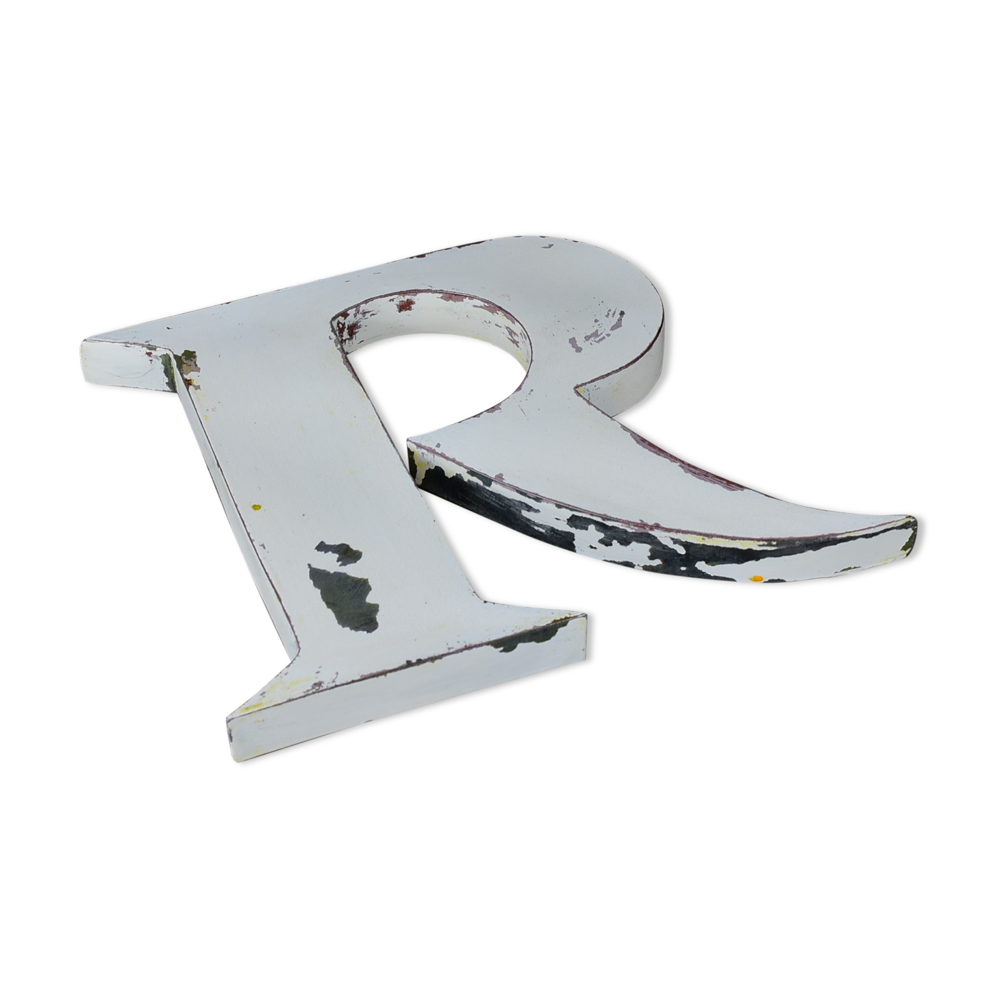 White zinc letter R