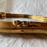 Large rococo mirror in gilded wood