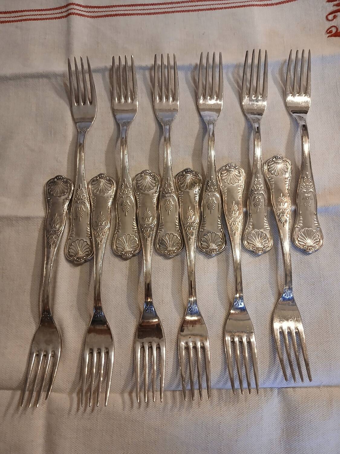 Antique flatware set for 51 place settings