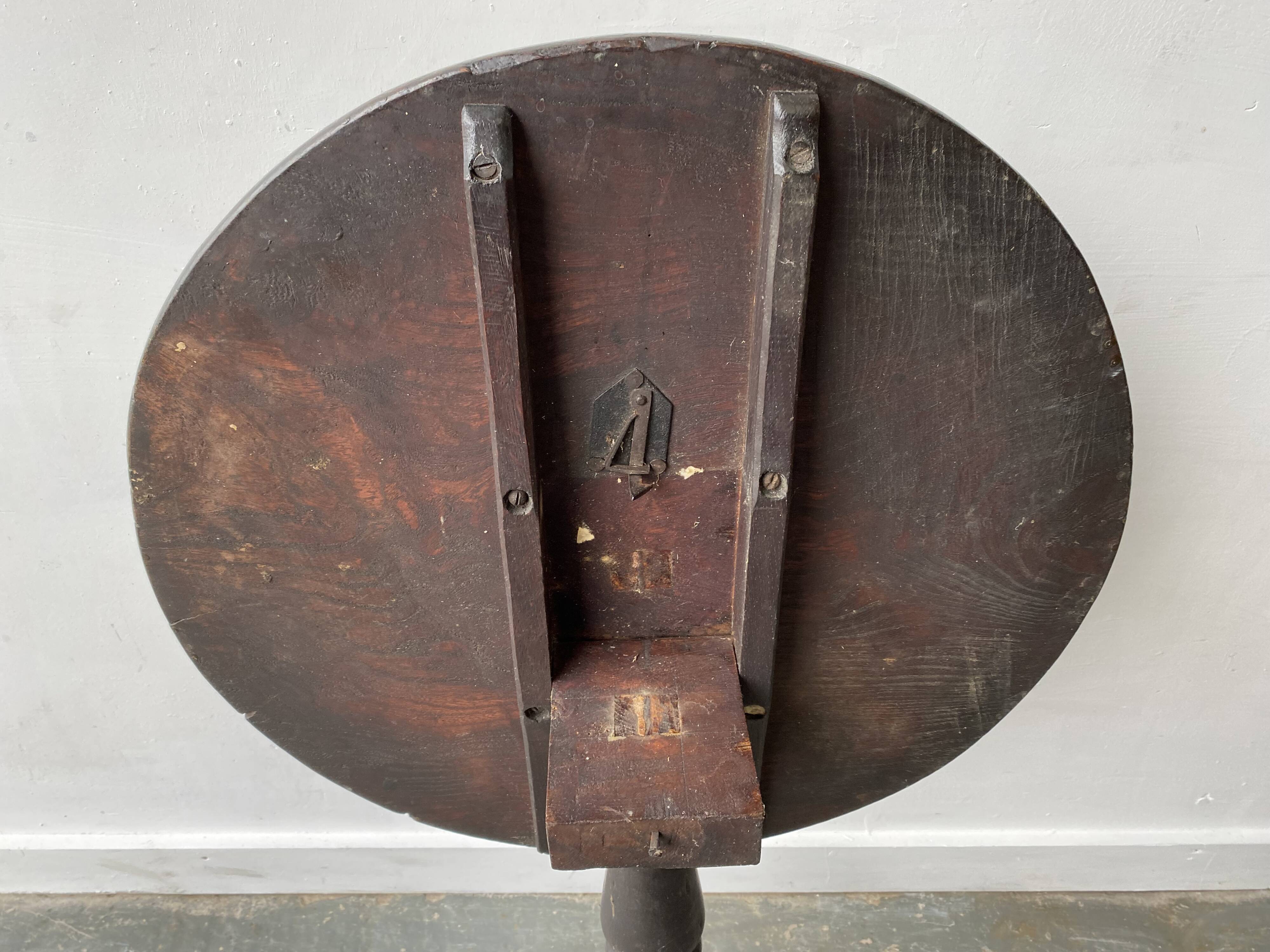 Antique Victorian English oak tilt top table