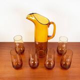 Amber glass carafe from the mid-century German Jagdhaus series and drinking glasses by Wilhelm Braun-Feldweg for Hirschberg, 1960s, set of 7.