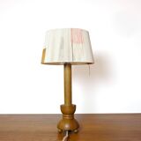 Wooden candle holder mounted as a lamp and its rope shade, 47.5cm.