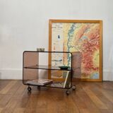 Smoked Plexiglas coffee table on wheels -