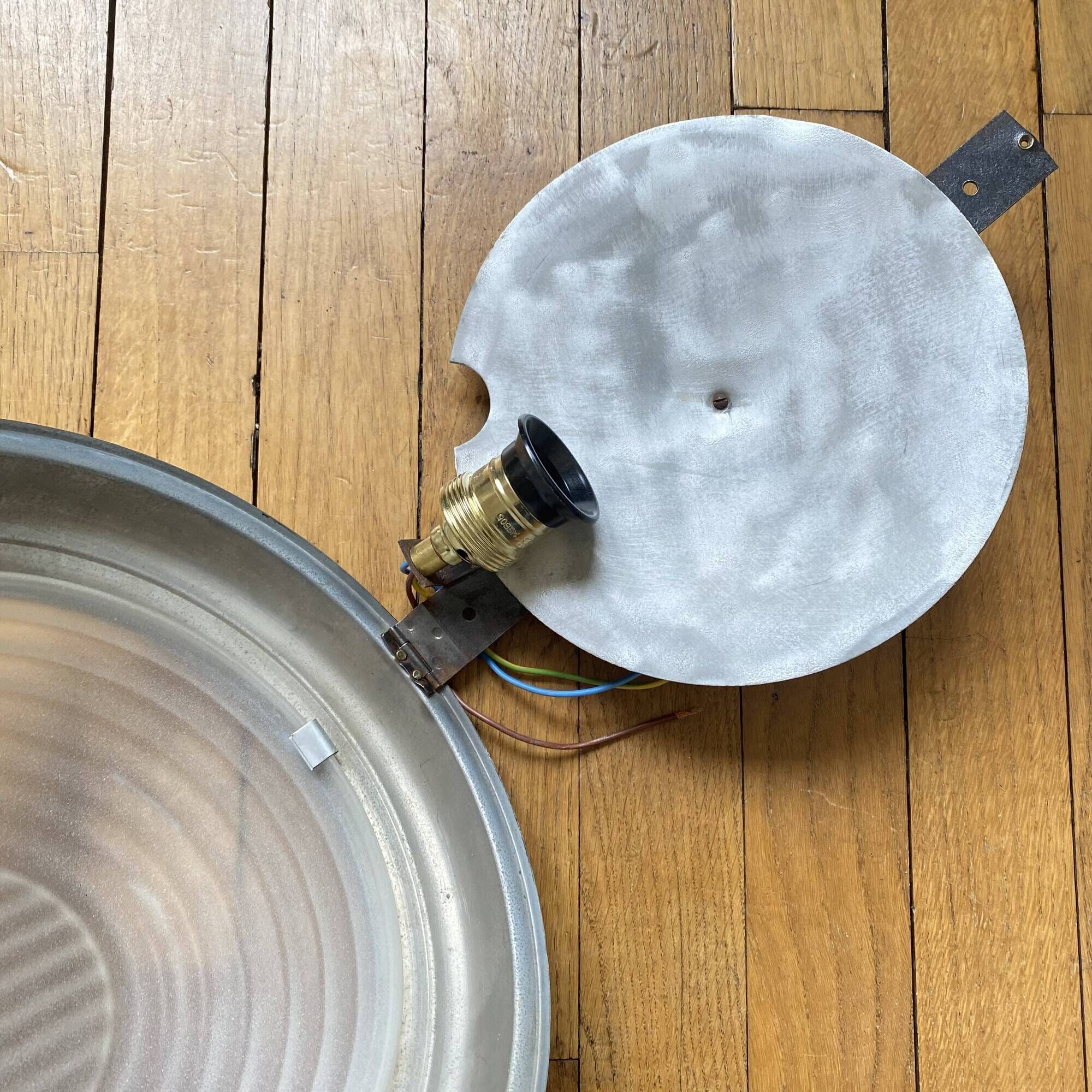 Thick glass ceiling light fixture with a chrome metal support, Holophane type.