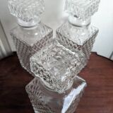 3 diamond-patterned chiseled glass carafes
