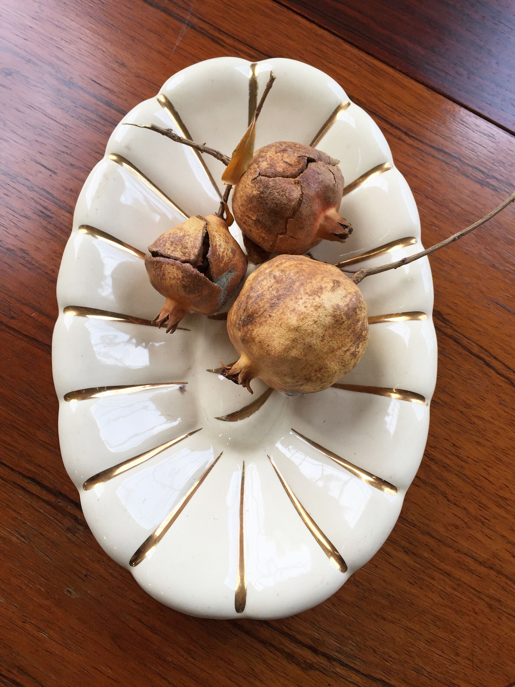 White and gold ceramic plate