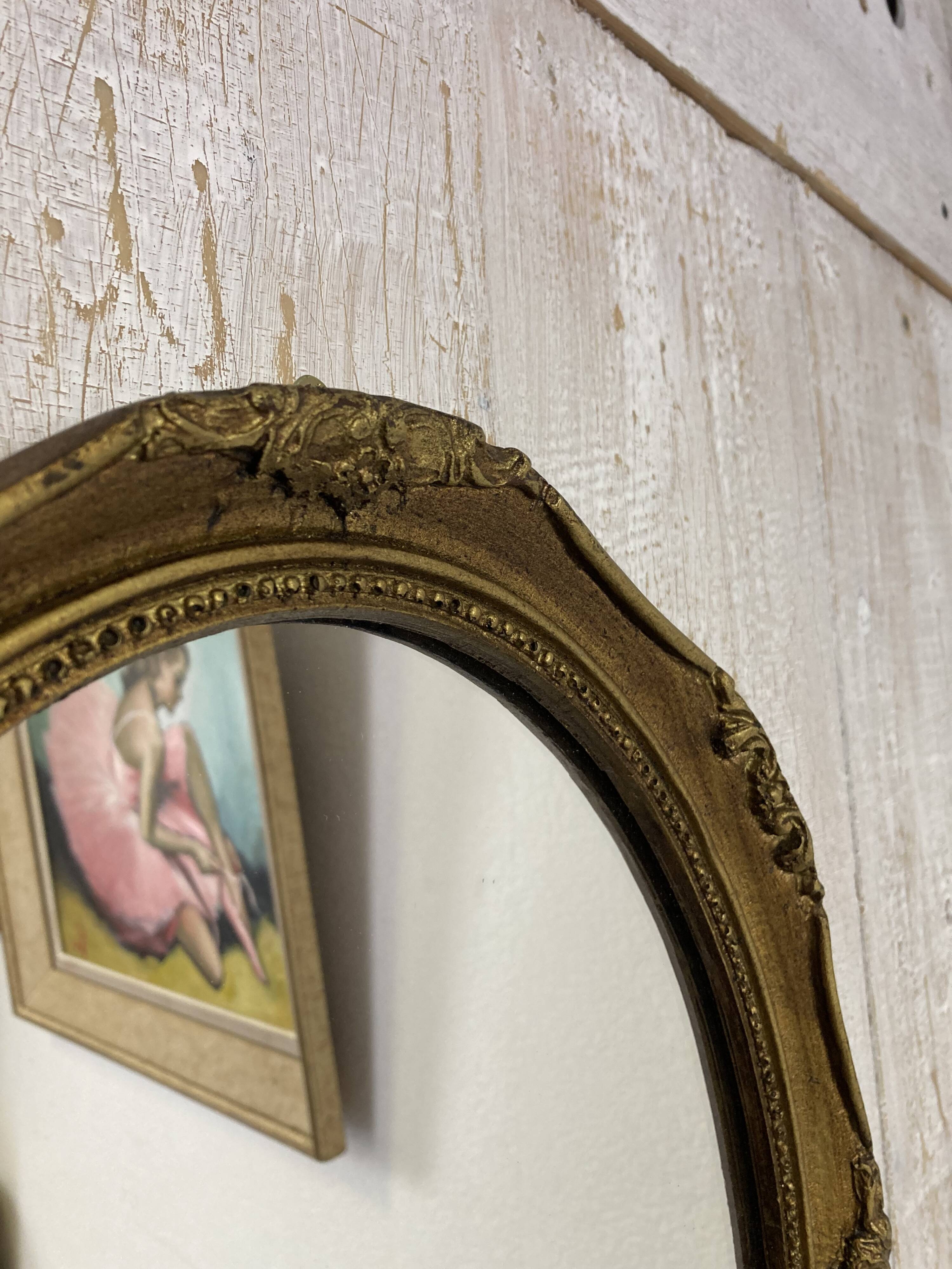 Antique oval mirror