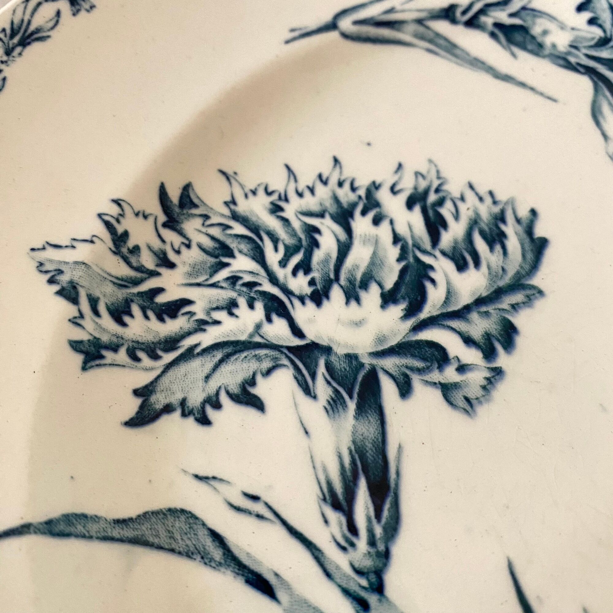 Antique dishes on foot in Luneville carnation porcelain