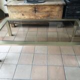 Smoked glass and brass coffee table