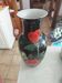 Black enameled Chinese vase with red flower decoration