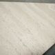 Series of 2 vintage travertine coffee tables published by Roche Bobois