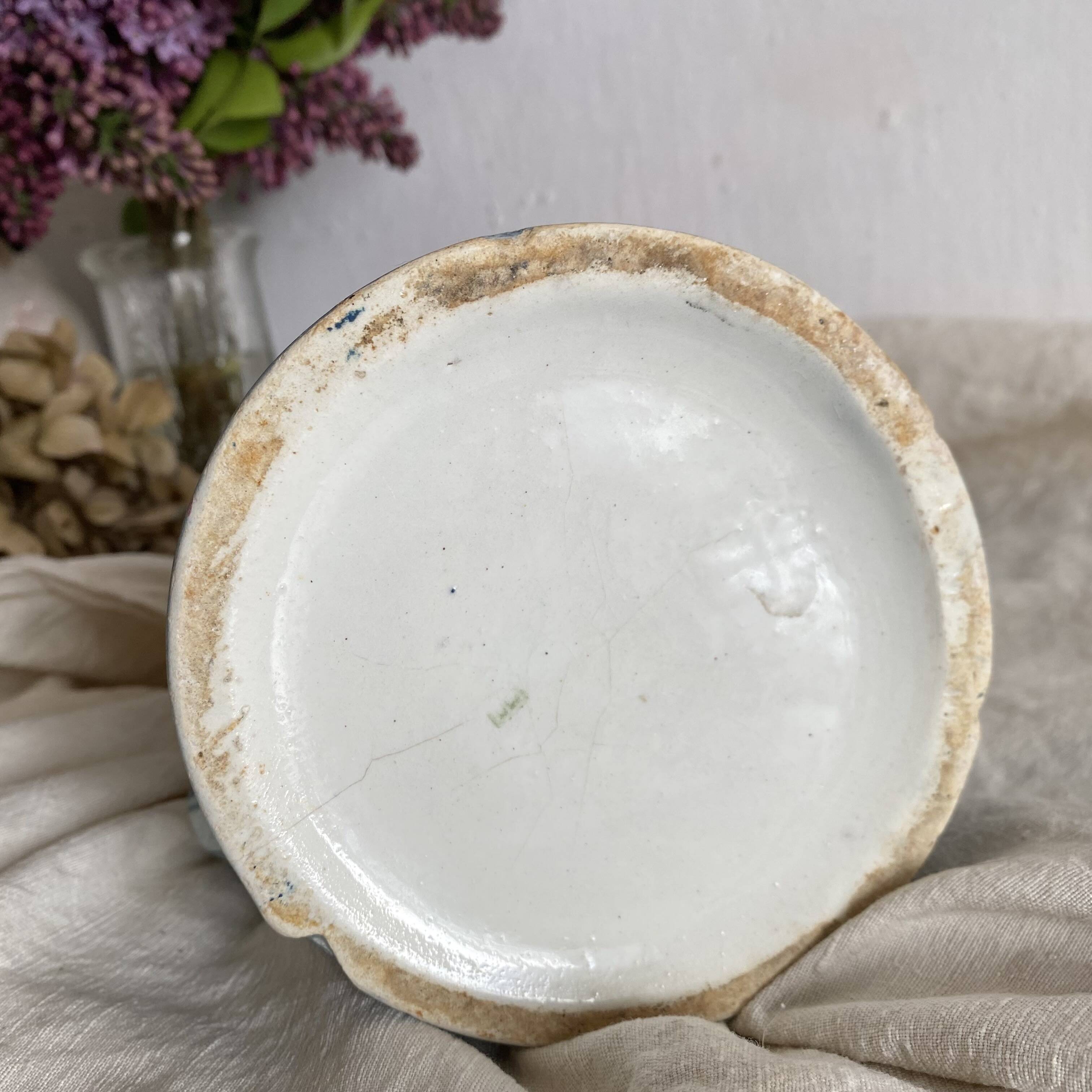 Art Nouveau slip pitcher with roses