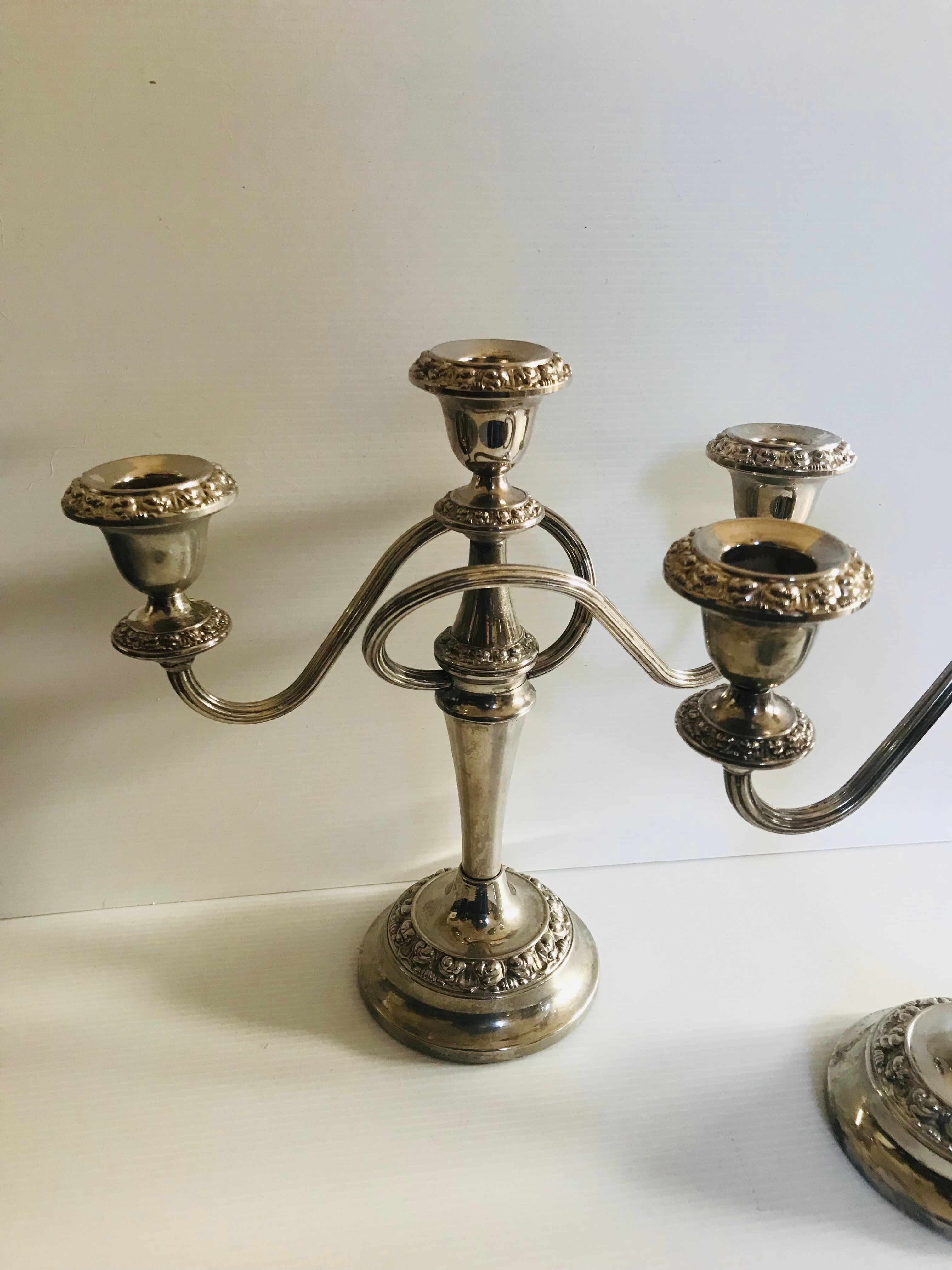 Pair of silver metal chandeliers