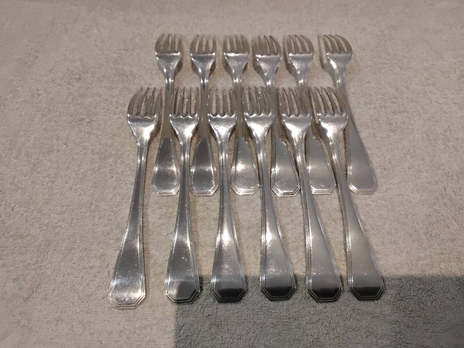 12 silver-plated table forks by Christofle America