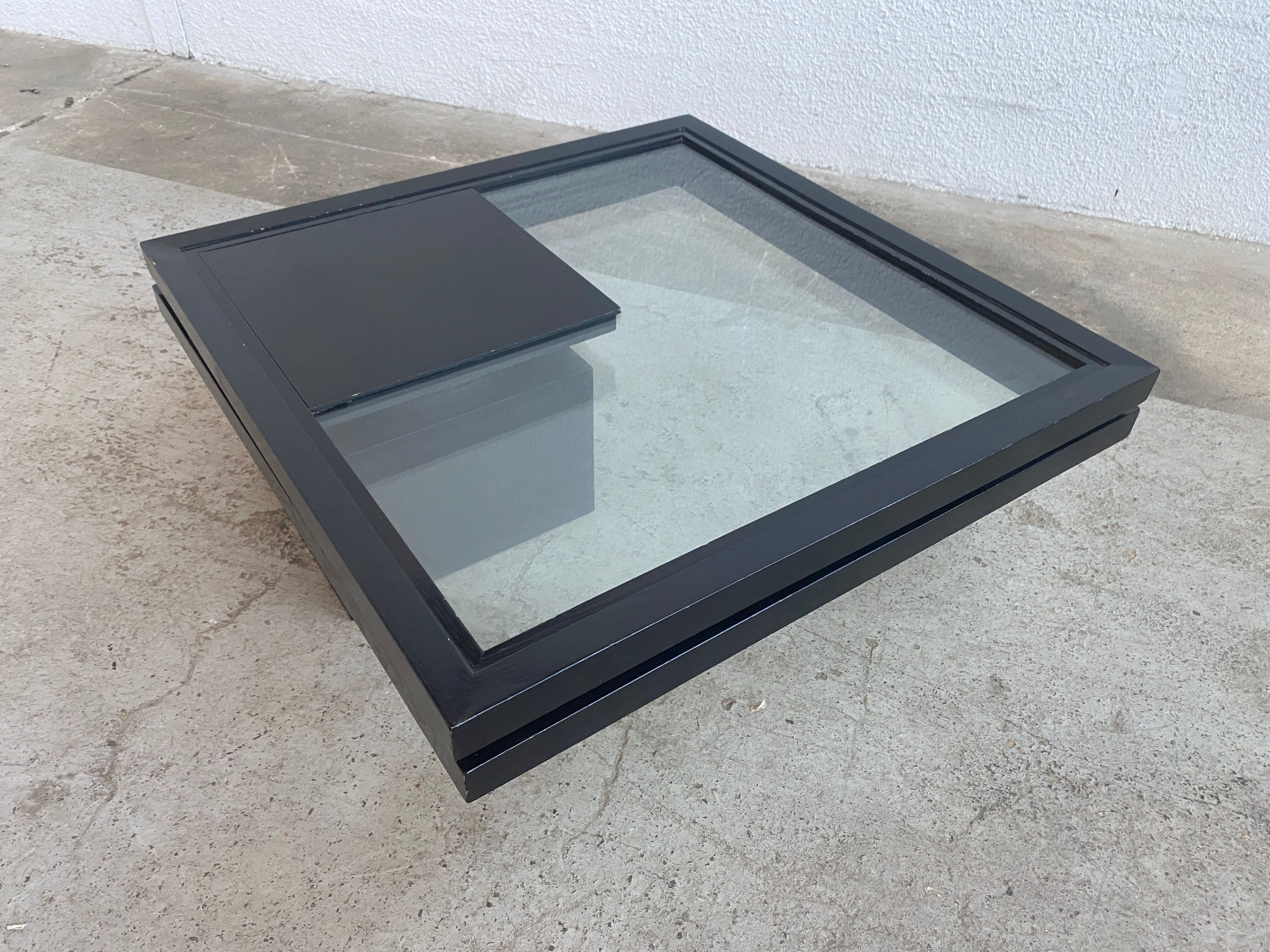 Coffee table with rotating top