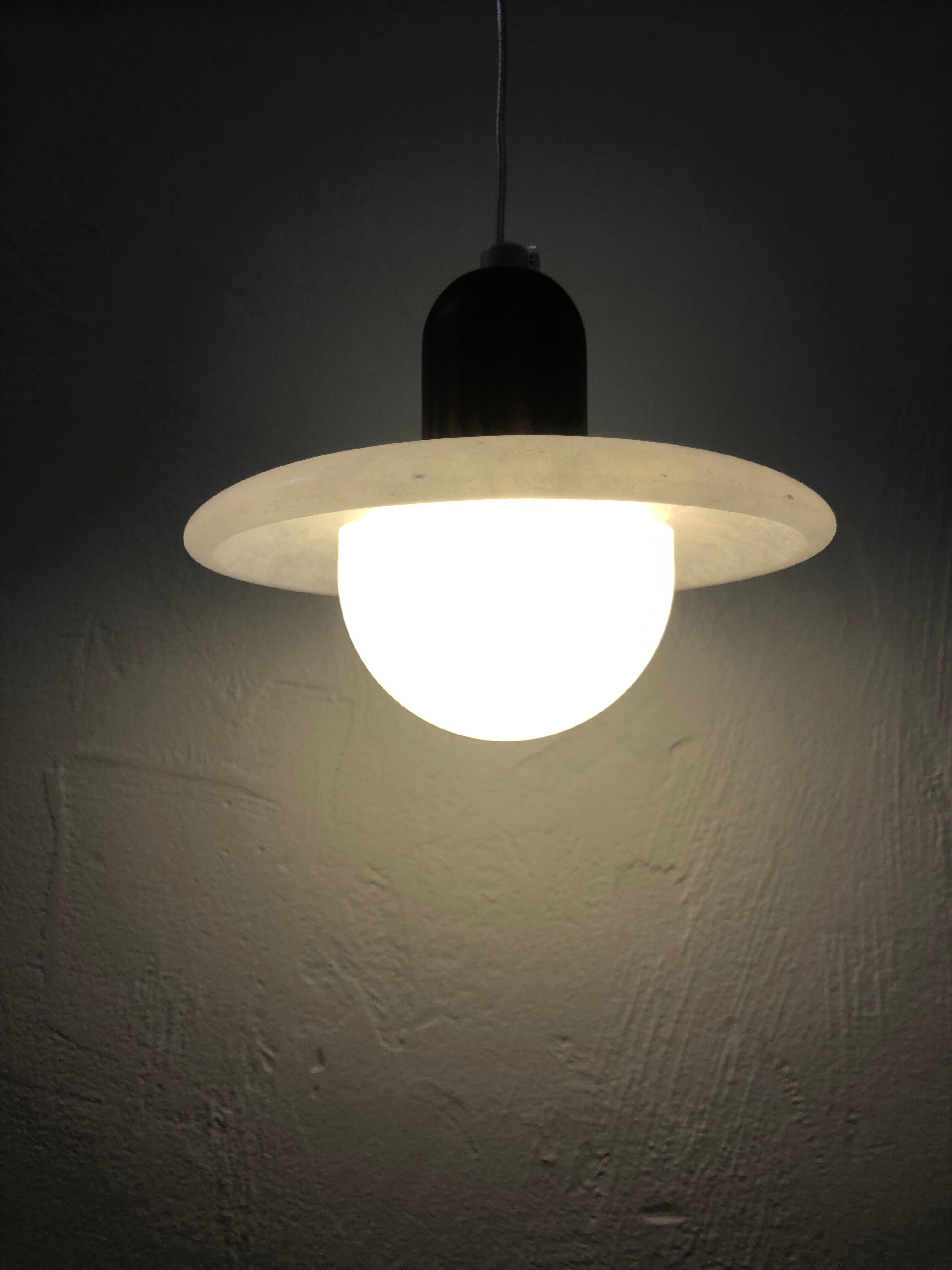Pair of onyx and walnut suspended light fixtures