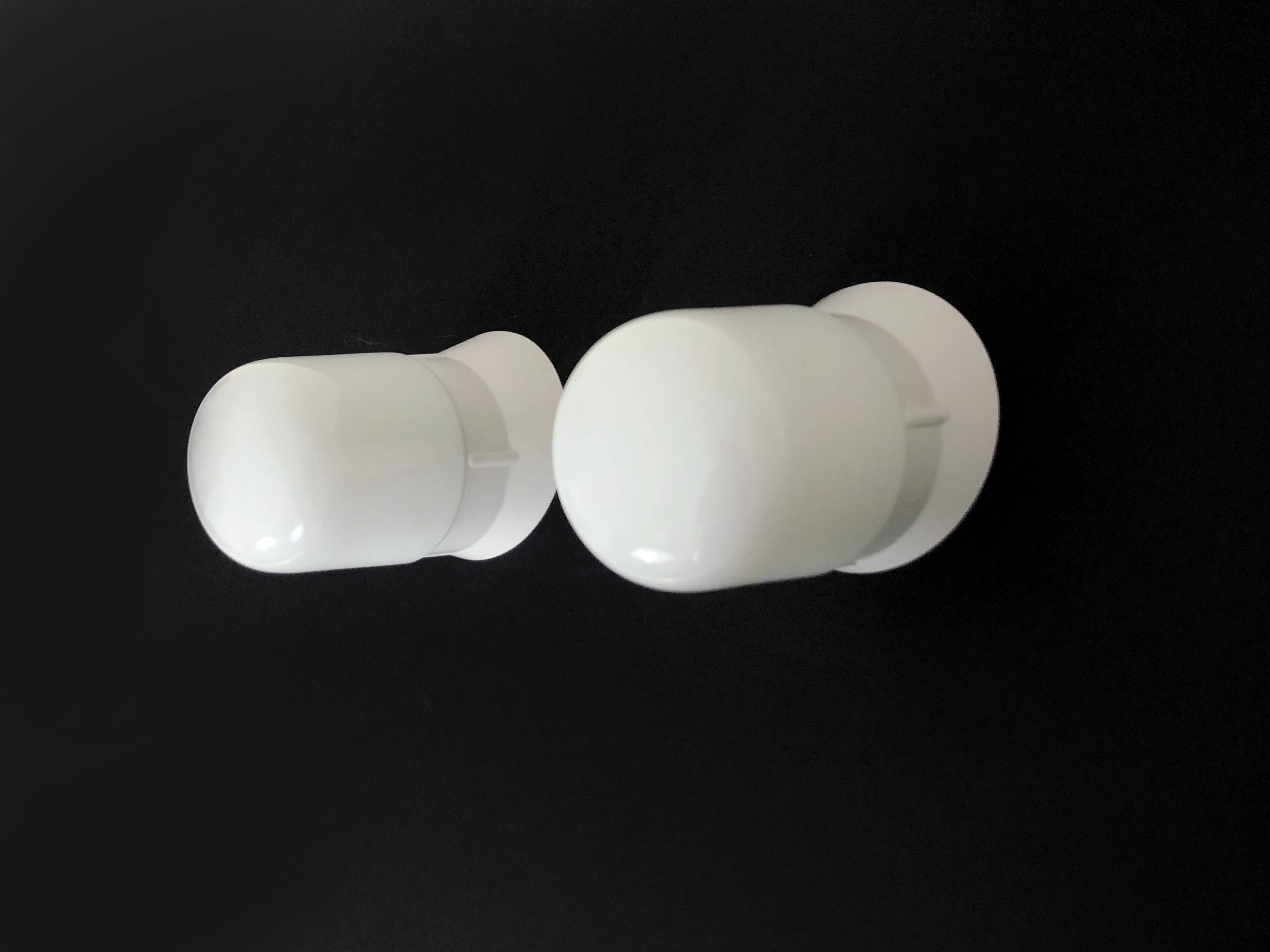 Pair of white oblique wall lights by Arno. 60s