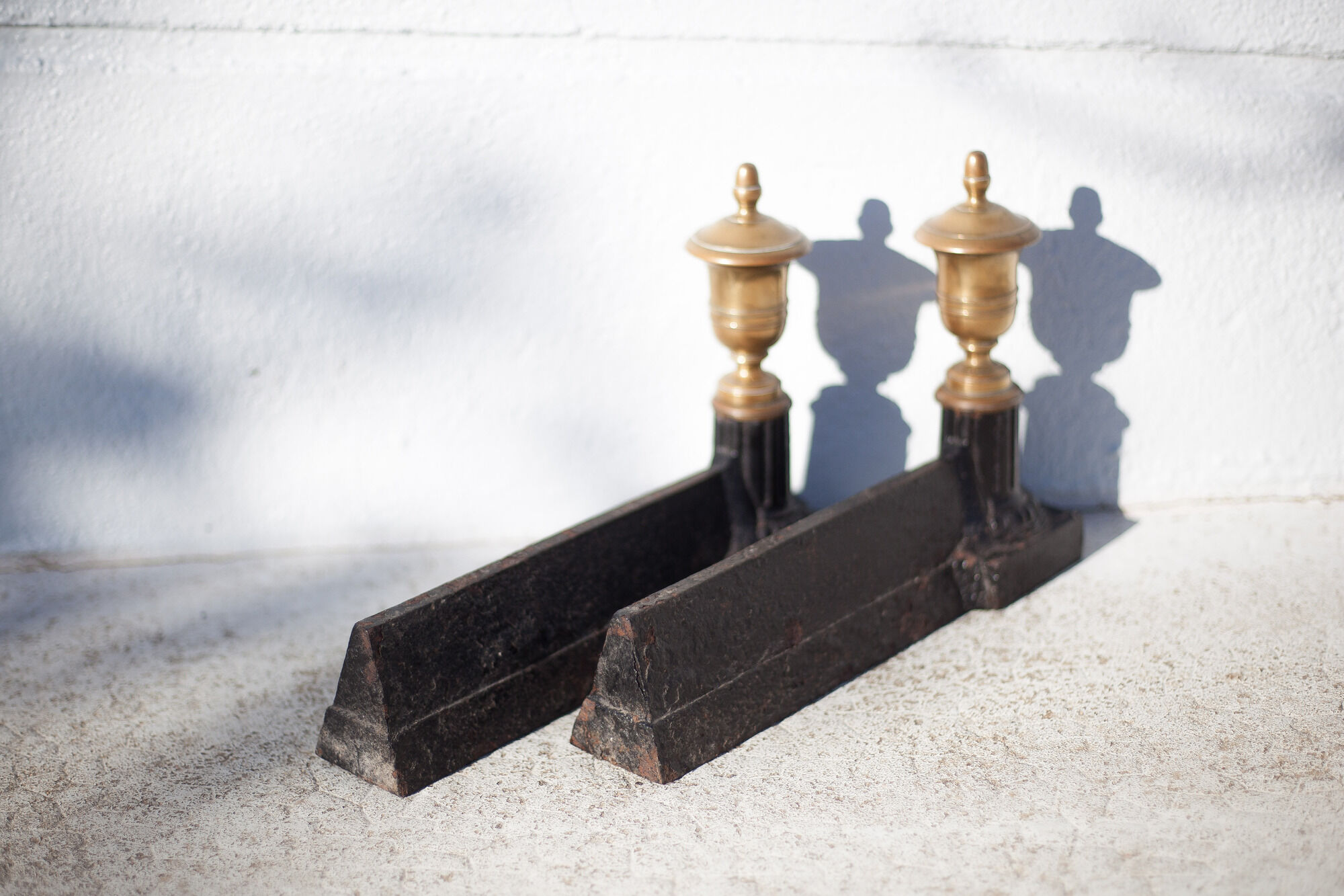 Cast iron and brass chenets