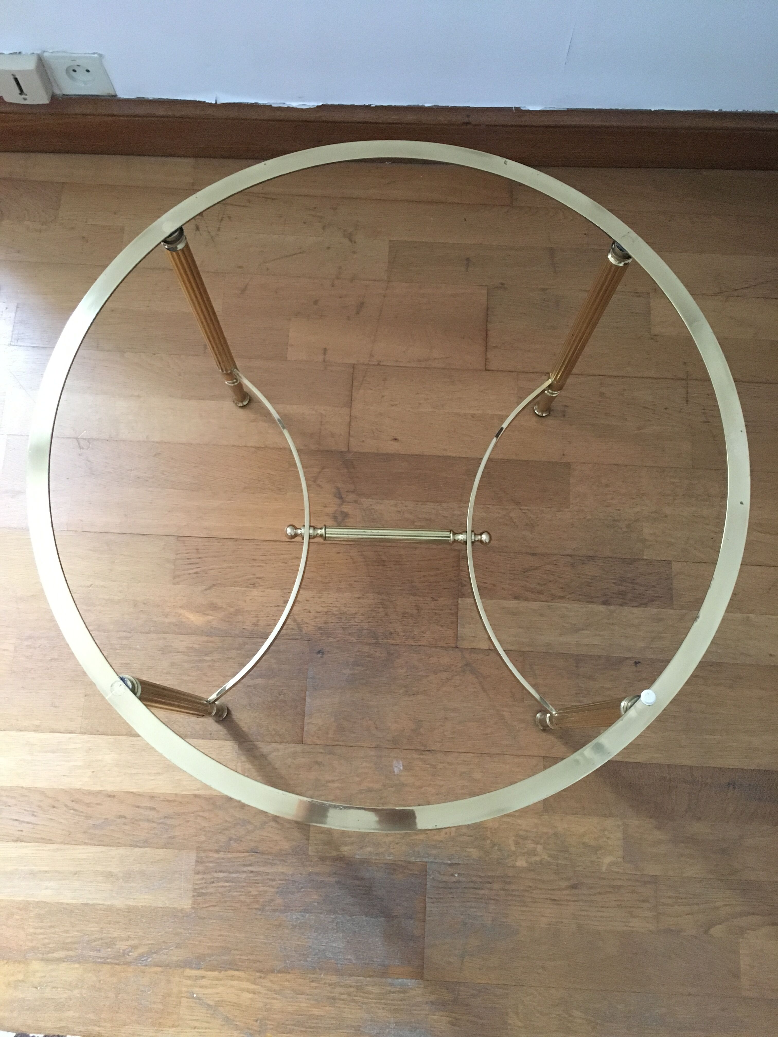 Brass round coffee table and smoked glass