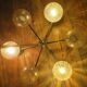Angelo Brotto gold-plated brass chandelier with 6  globes, Italy 1960s