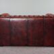 Chesterfield sofa in red cowhide leather, 2.5 seats