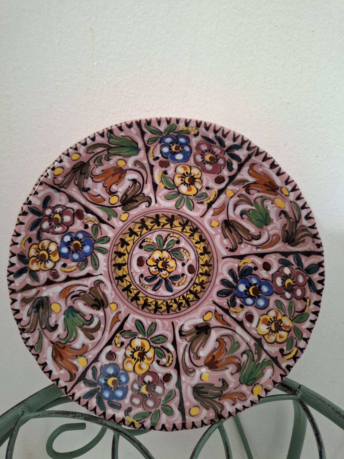 Decorative floral plate signed