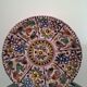 Decorative floral plate signed