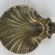 Shell-shaped catch-all tray